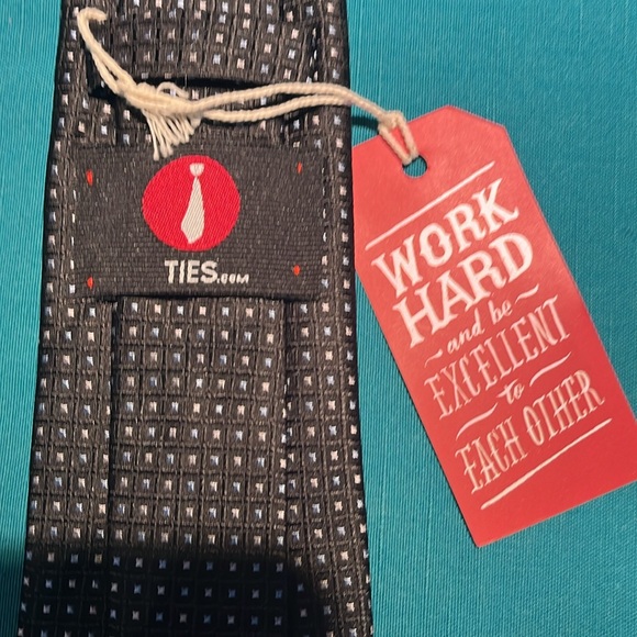 10 new ties from Ties.com. Whls. is $20. Black silk with lt.blue and silverdots. - Picture 2 of 5